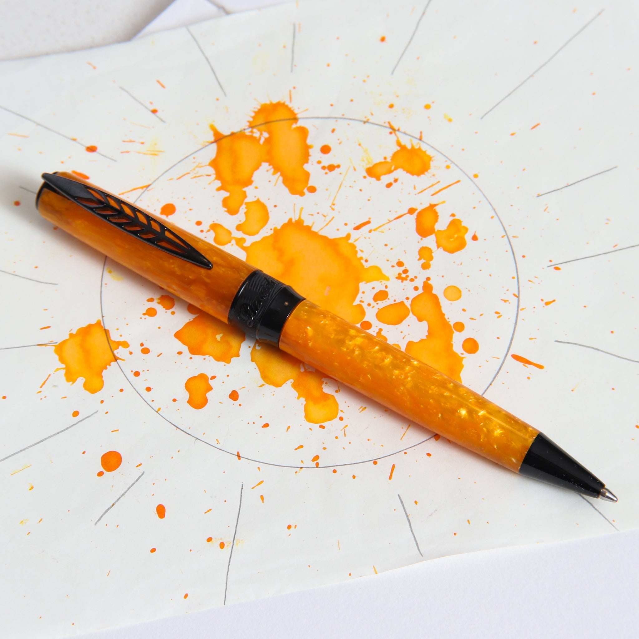 A Montegrappa roller ball pen in orange, together with a Louis