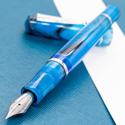 Delta Duna Fountain Pen - Blue Oasis Palladium Trim Uncapped