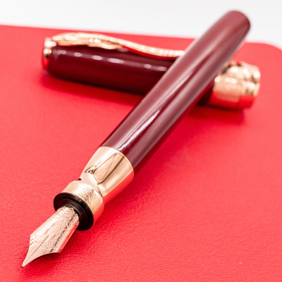 Pineider Classic Fountain Pen - Bordeaux & Rose Gold uncapped